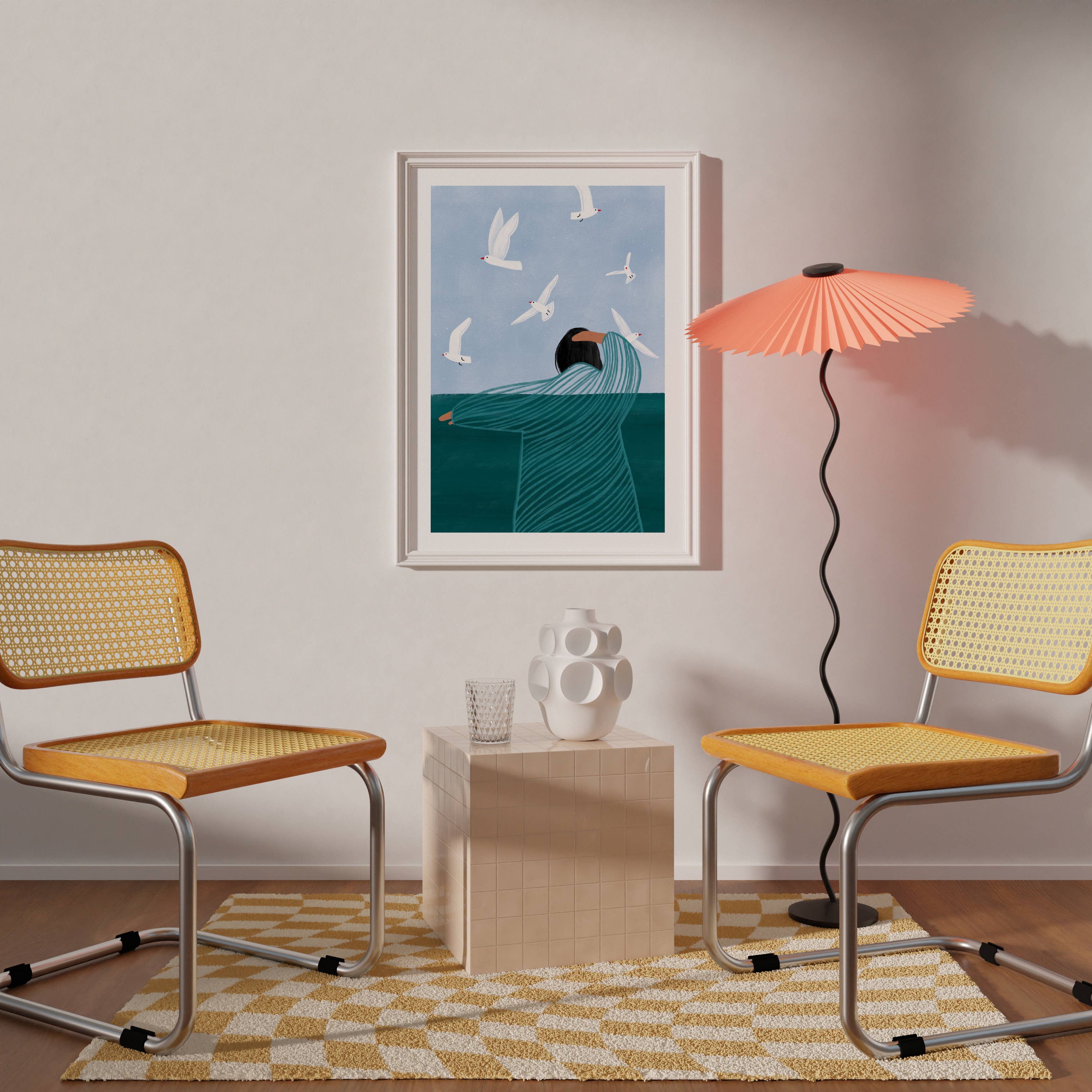 Bea Müller 'Seaside' A3 Unframed Art Print framed for reference and hanging on a wall above a side table and two chairs