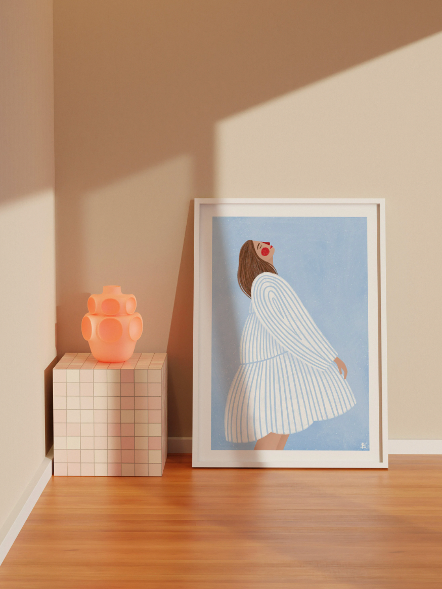 Bea Müller 'The Woman With The Blue Stripes' A3 Unframed Art Print standing framed against a wall and next to a side table