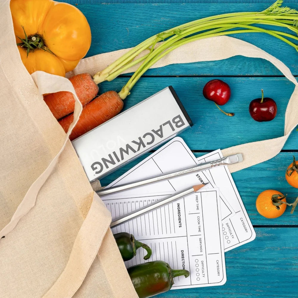 Blackwing Volume 140 Ltd Edition Pencil box in a canvas tote bag with a mix of fruit and vegetables and recipe cards