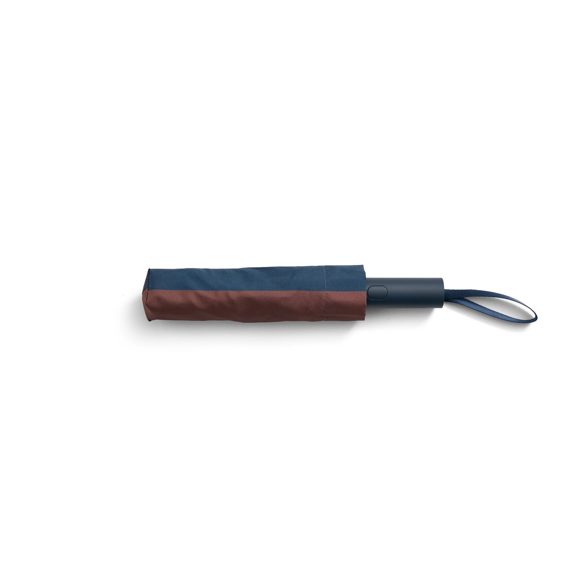 HAY regn umbrella in brown displayed closed on a white background