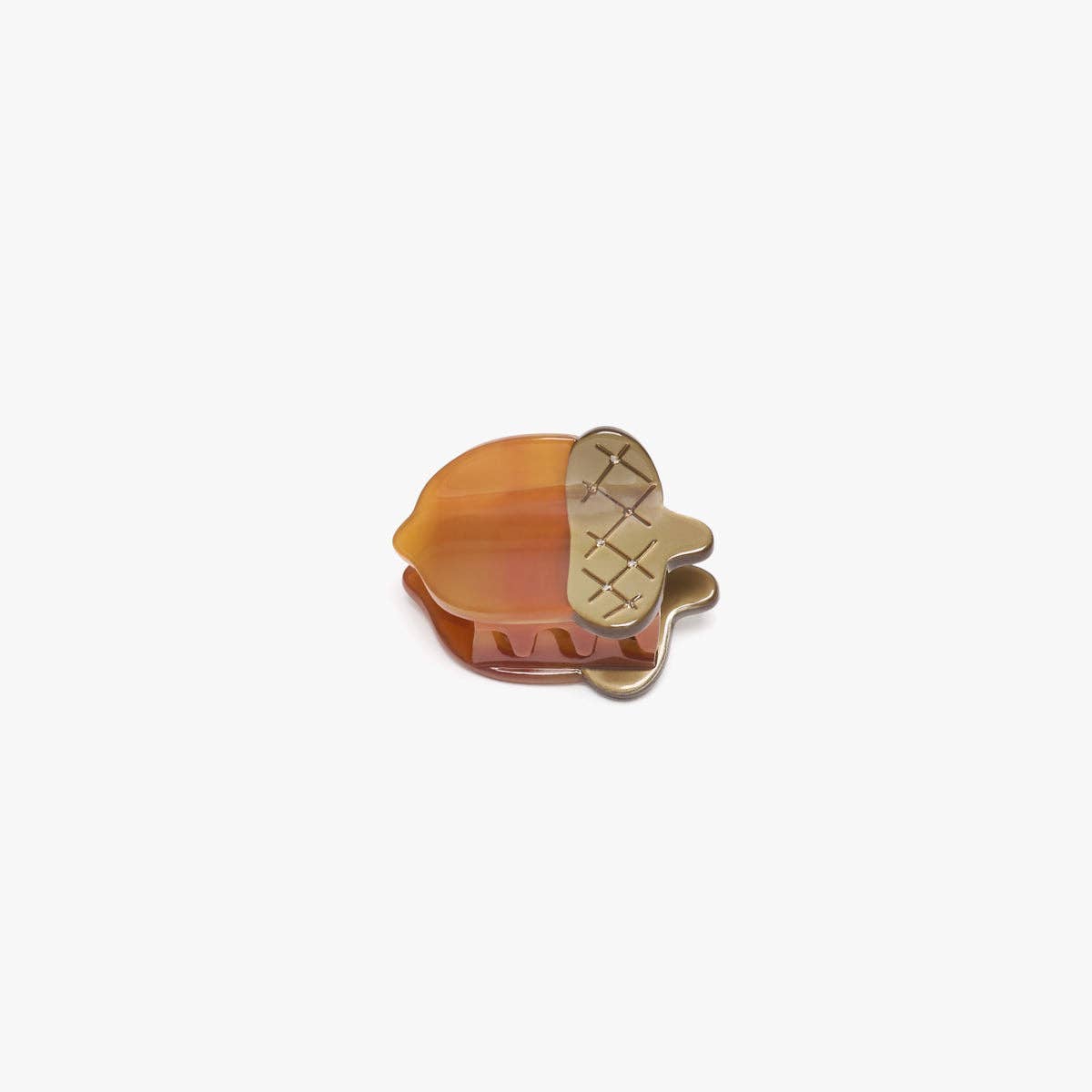 Acorn shaped hair clip on a white background