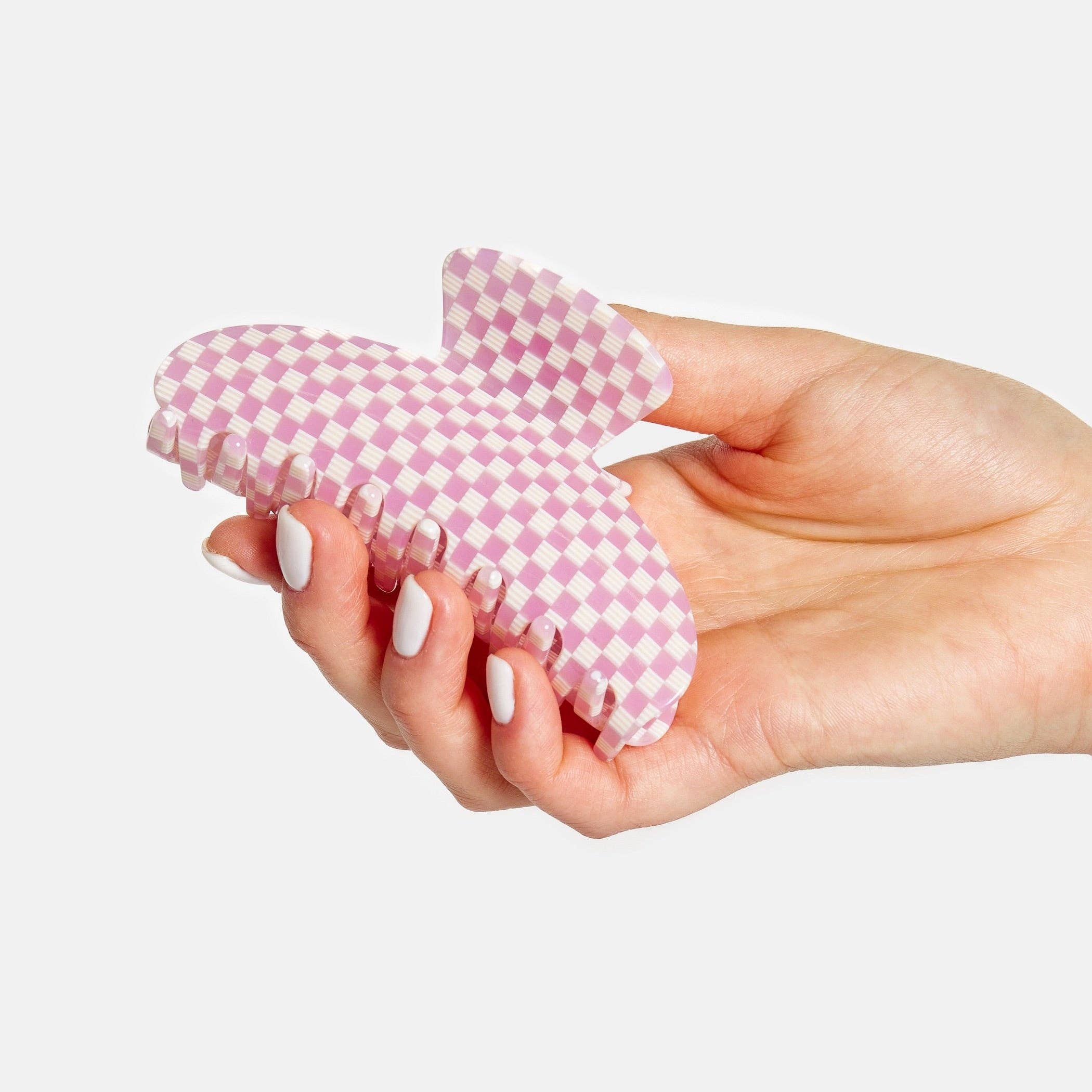 CHUNKS Baby Dolly Hair Claw in Shortcake being held by a models hand