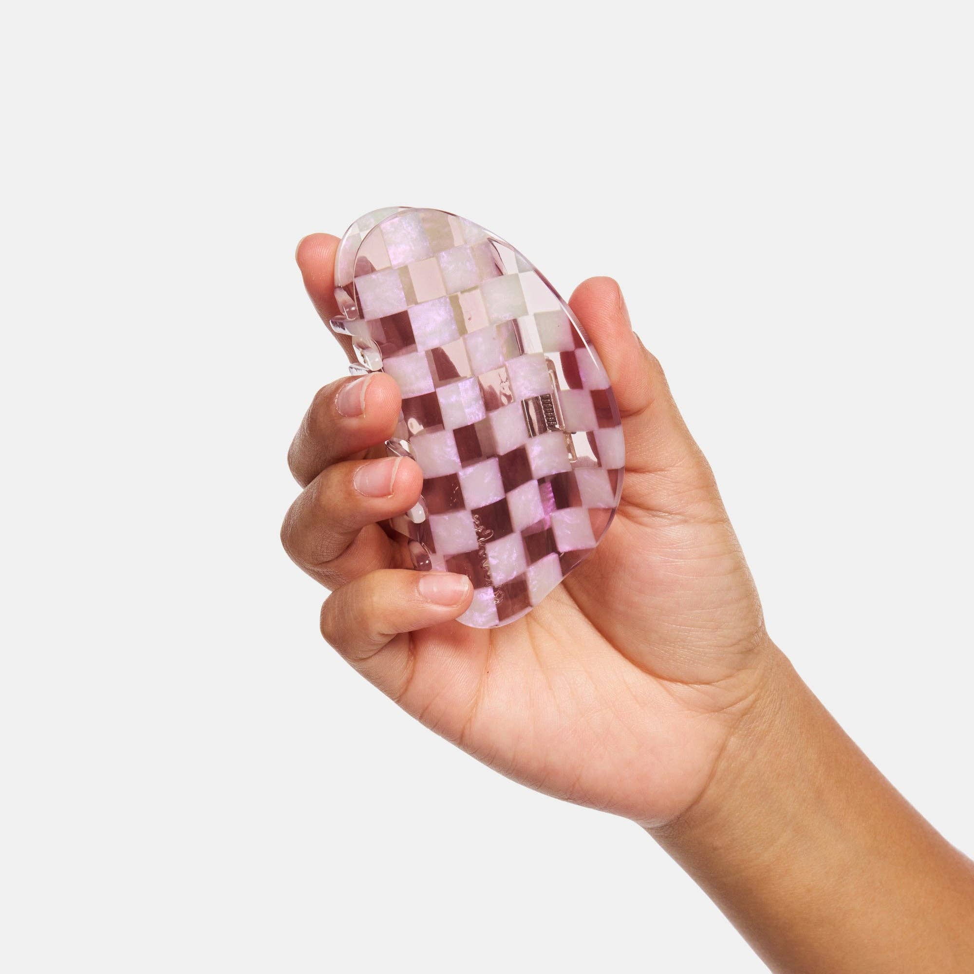 CHUNKS Checker Hair Claw in Smokey Quartz being held by a models hand