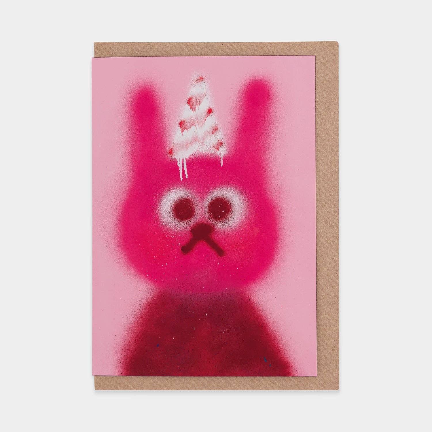 Bruised Tomato blank greetings card by Jon Burgerman -  a pink spraypainted rabbit in a dripping white and red party hat