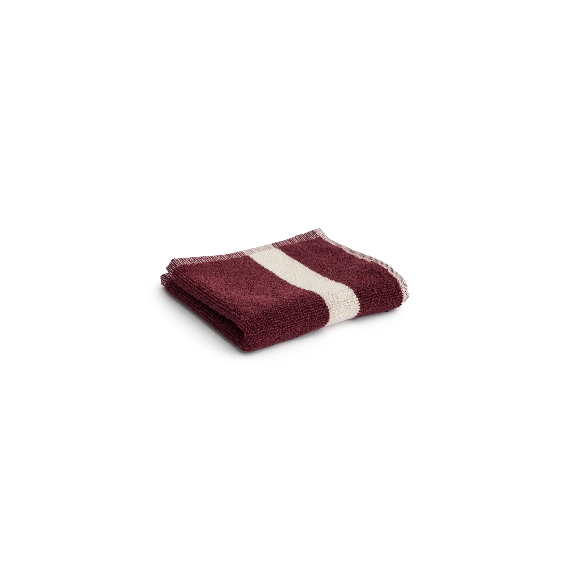 HAY burgundy stripe wash cloth folded on a white background