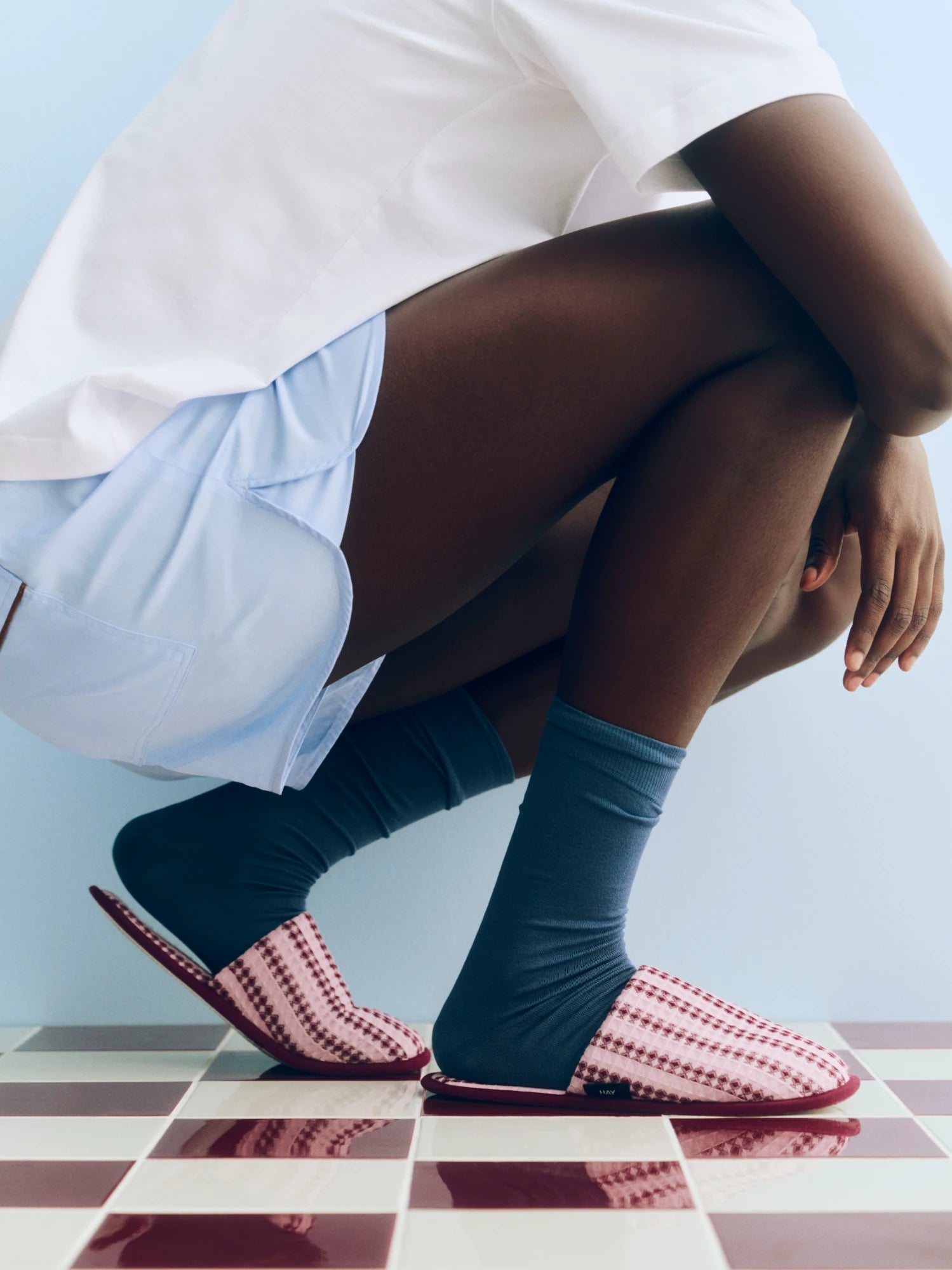 HAY waffle slippers in cool pink worn by a model