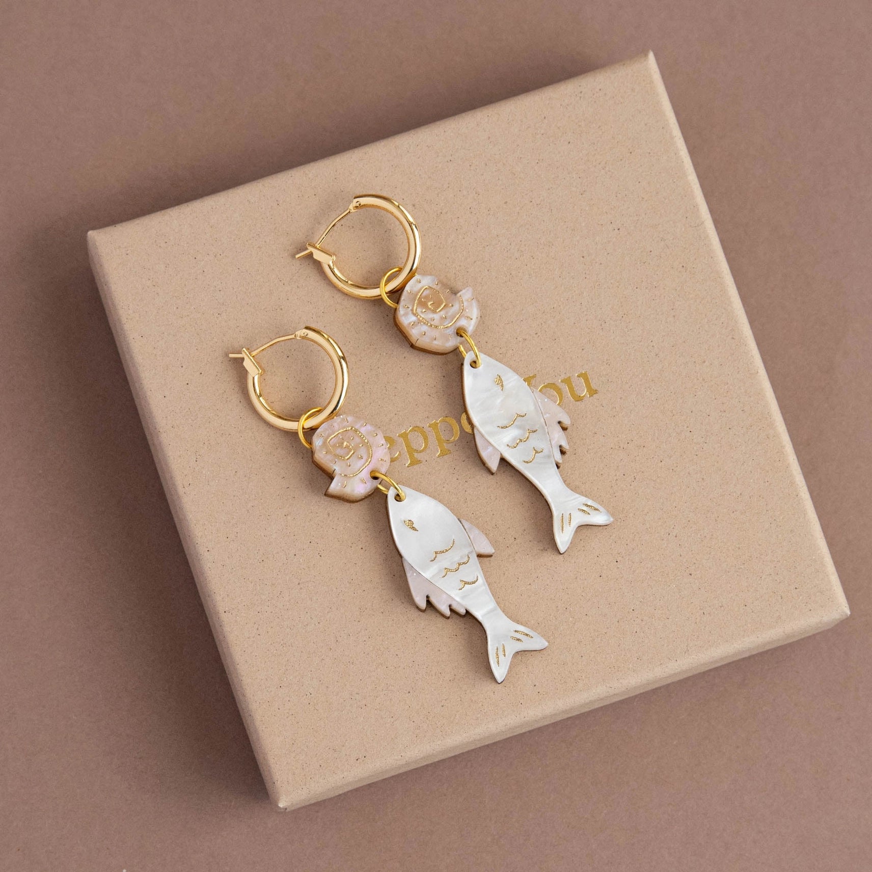 Pepper You Acrylic & Wood Anchovy & Shell Hoop Earrings in pearly white and apricot gold