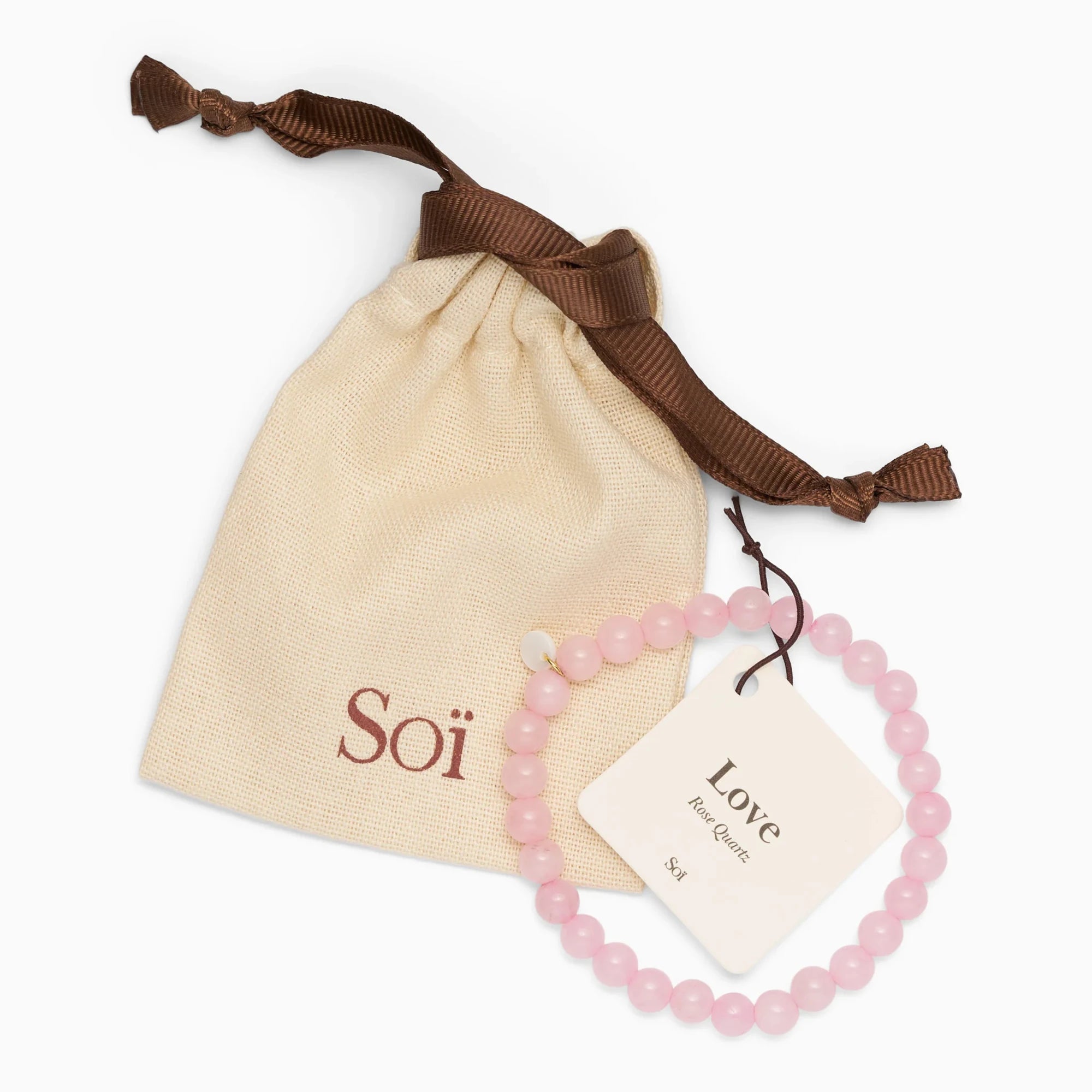 Soï Copenhagen essential Rose Quartz crystal stretch bracelet with jewellery pouch